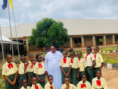Principal with students